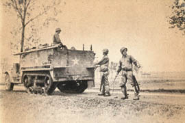 [6th Armored: Halftrack Lays Signal Cable]
